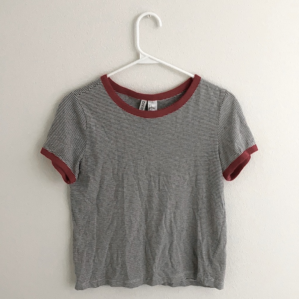 Black and white stripped t shirt with red accents